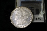 1878 S Morgan Silver Dollar, lightly toned Uncirculated.