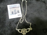 Sterling silver necklace with a Celtic design center piece, 8.9 grams, marked with hallmarks and sta