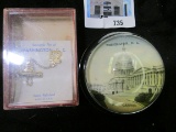 Pair of mementos from Washington DC - a glass paperweight with a magnified view of the Capitol Build