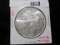 1881-S Morgan Silver Dollar, BU, MS64 value $80, MS65 value $165