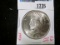 1924 Peace Silver Dollar, BU, MS63 value $40, MS64 value $60