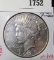 1935 Peace Silver Dollar, VG holed, plugged, value $30+