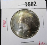 1964 Kennedy Half Dollar, BU toned, value $15+