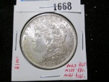 1883-O Morgan Silver Dollar, BU, MS63 value $65, MS64 value $80, MS65 value $165