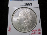 1884-O Morgan Silver Dollar, BU, MS64 value $80, MS65 value $165