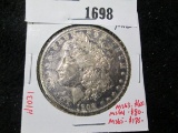 1902-O Morgan Silver Dollar, BU toned, MS63 value $65, MS64 value $80, MS65 value $175