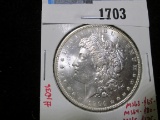 1904-O Morgan Silver Dollar, BU toned, MS63 value $65, MS64 value $80, MS65 value $175
