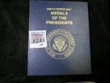 Whitman style Bookshelf album of United States Mint Medals of the Presidents, contains 52 US Mint pr