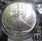 1986 One Ounce .999 Fine Silver American Eagle. BU. Encapsulated.