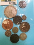 Group of Coins, some of which appear to be replicas. Taped on a piece of heavy paper. Some Silver. (