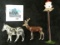 Group of 3 metal figures - a zebra, a reindeer, and a bird house on a VERY tall pole. There's GOT to