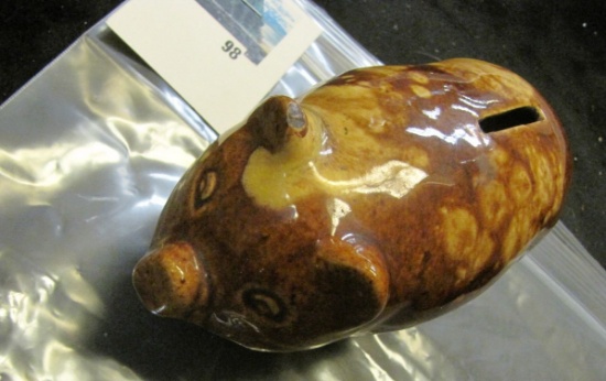 Antique ceramic piggy bank, brown with tan spots