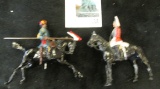 Pair of metal soldiers on horseback, made by BRITIANS