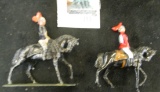 Pair of metal toy soldiers on horseback