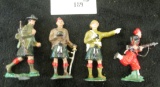 Group of 4 metal toy soldiers from Ireland, all marked EIRE on bottom