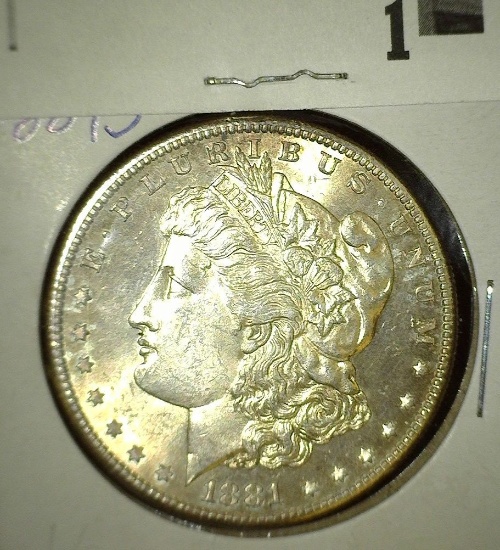 1881 S Morgan Silver Dollar, lightly toned High grade.