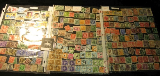 Over 200 various Foreign Stamps in plastic pages.