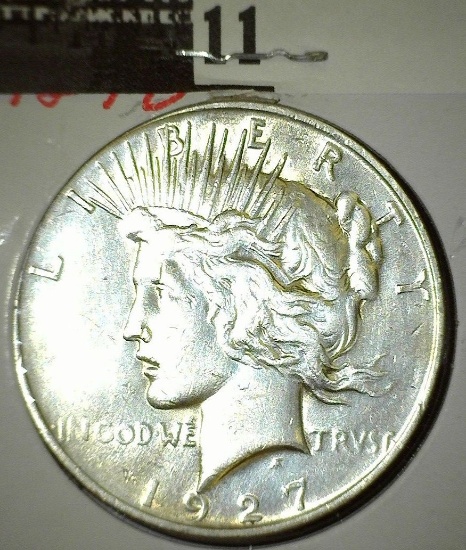 1927 D Peace Silver Dollar.