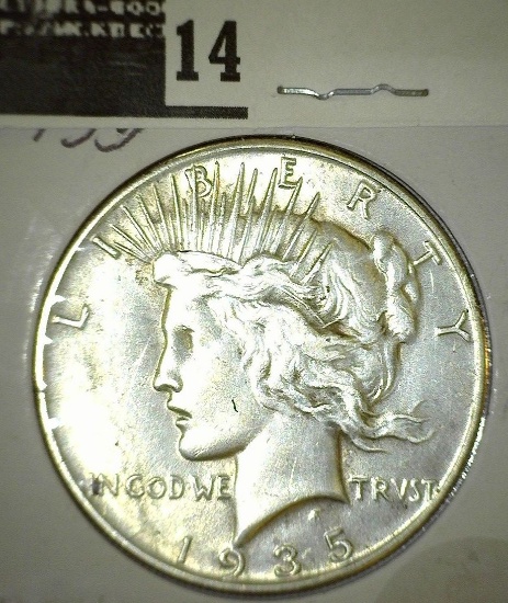 1935 P Peace Silver Dollar.
