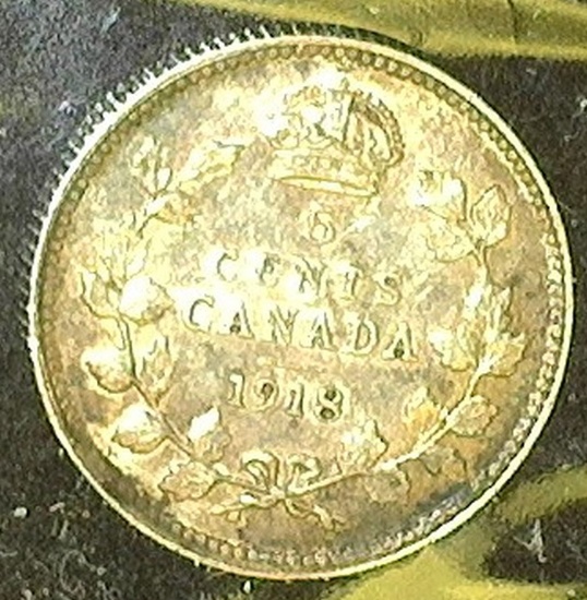 1918 Canada Five Cent Silver, EF with stain.