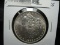 1886 P Morgan Silver Dollar, AU.