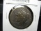 1921 P Peace Silver Dollar, Fine. Probably a contemporary counterfeit, sold for educational purposes