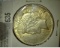 1927 D U.S. Peace Silver Dollar, EF.