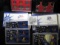 1975 S, 82 S (cloudy toning), 2001 S, & 2004 S U.S. Proof Sets, all with Dollar coins and original b