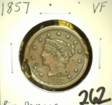 1857 U.S. Large Cent, heavily damaged rim.