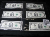 Series 1976 & (5) Series 1995 $2 Federal Reserve Notes in two plastic pages.