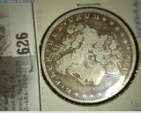 1892 O Morgan Silver Dollar.