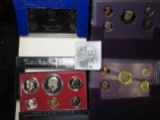 1974 S, 83 S, 88 S, & 89 S U.S. Proof Sets, all with Dollar coins and original boxes of issue.