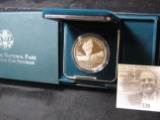 1999 P Yellowstone National Park Commemorative Silver Dollar in original box of issue.