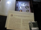 1984 S U.S. Prestige Proof Set in original box with literature. Cotains a Silver Olympics Dollar.
