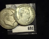 Two Adolf Hitler Fantasy German Dollars in a plastic bag.