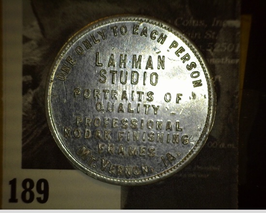 GOOD FOR/$1.00/AT/LAHMAN STUDIO/GOOD FOR $1.00/ON A CASH/PURCHASE OF/1 DOZ./PHOTOGRAPHS AT $10.00 OR