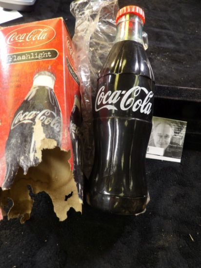 Coca-Cola Flashlight, box badly damaged. Never tested, but looks fine.