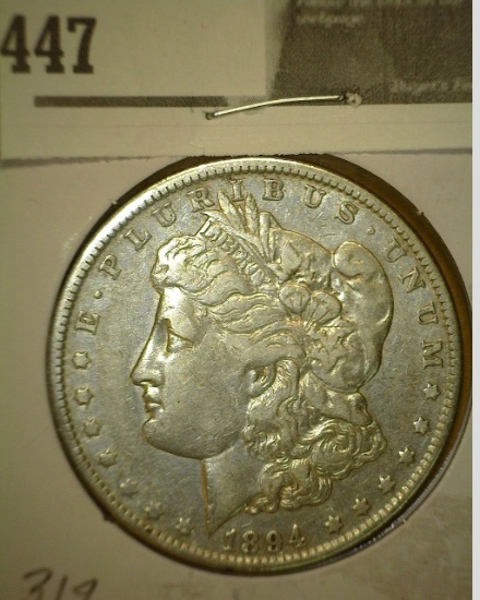 1894 O Morgan Silver Dollar.