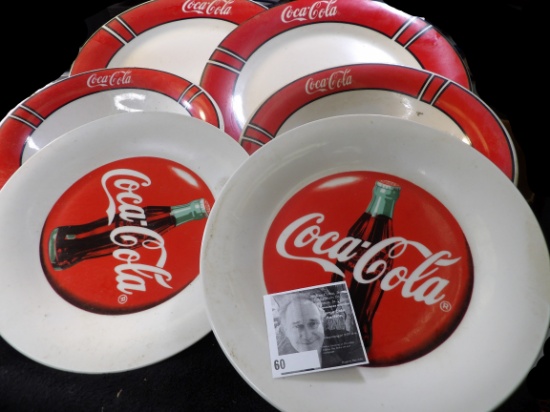 (2) Plates, (2) Saucers, & (2) Bowls with Coca-Cola designs.