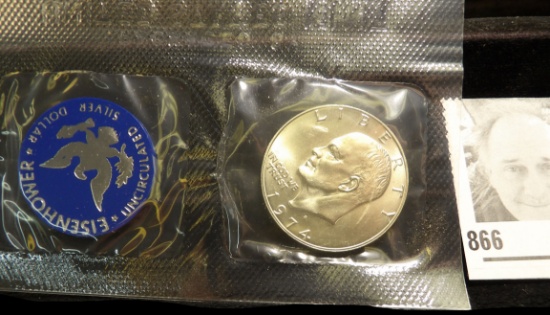 1974 S Gem BU Silver Eisenhower Dollar in original U.S. Mint cellophane.
