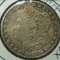 1890 S Morgan Dollar XF - toned