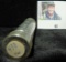 1943 D High Grade Roll of World War II Steel Cents in a plastic tube, which has shrunk holding the c