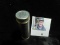 1943 High Grade Roll of World War II Steel Cents in a plastic tube, which has shrunk holding the coi