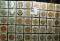 (40) various Wooden Nickels from Iowa in a pair of plastic pages.