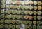 (60) various Wooden Nickels from Iowa in a pair of plastic pages.