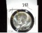 1964 D Gem BU Kennedy Silver Half Dollar.