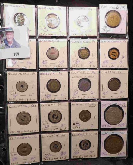 20-Pocket Plastic Page with (18) different Pennsylvania Transportation Tokens, McCormick Reaper Meda