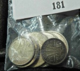 Group of 7 foreign silver coins - contains over 2/3 oz of silver