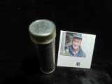 1943 High Grade Roll of World War II Steel Cents in a plastic tube, which has shrunk holding the coi