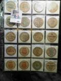 (23) various Wooden Nickels from Iowa in a pair of plastic pages. Regular size from Amana to Decorah